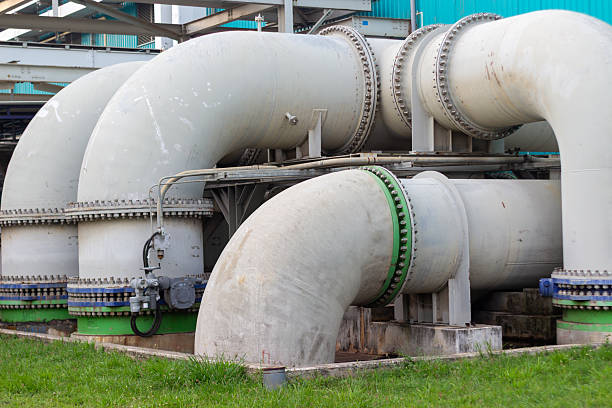 istock Industrial landscape featuring large white pipelines in a manufacturing plant setting 2227012157