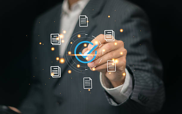 istock Service guarantee, Validation concept for business process automation, quality assurance management, certification, digital transformation. Businessman touching checked icon on virtual screen. 2227012249