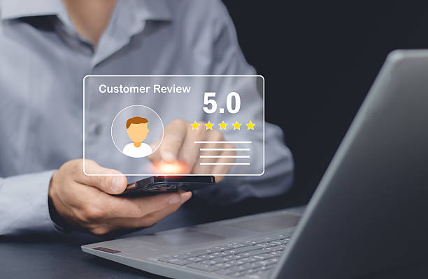 istock Businessman using laptop give rating to service experience on online application, 5-star satisfaction, satisfaction feedback review, good quality most. 2227012805