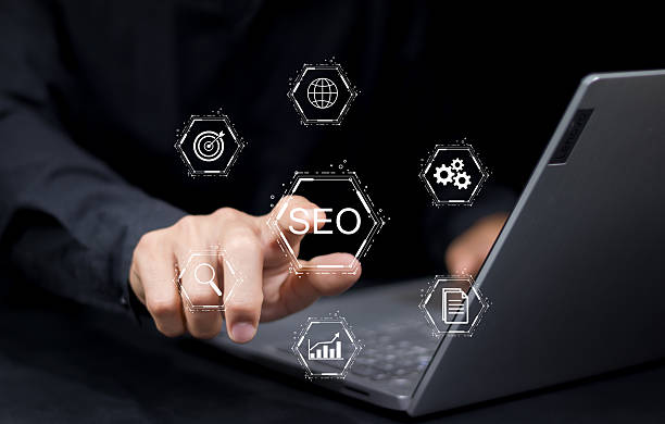 istock Closeup businessman working remotely at office, SEO search engine optimization concept diagram with icon. 2227013020