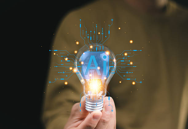 istock Business man holding bulb light with Artificial intelligence AI, network internet online, AI generates robot automation machine learning, innovation futuristic technology concept. 2227014695