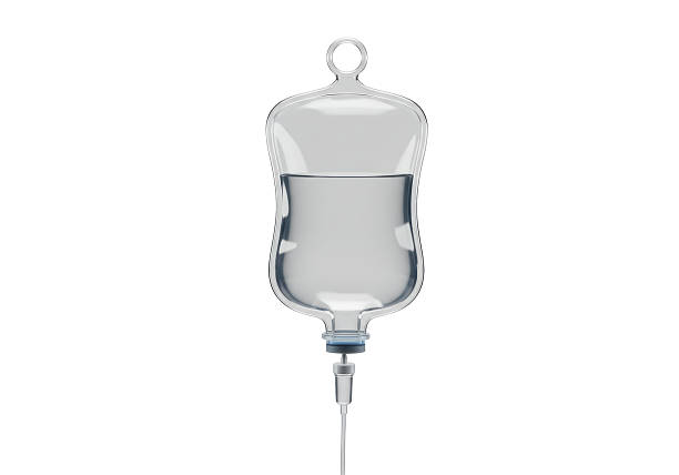 istock Isolated Medical IV Drip Bag with Clear Liquid 2227014765