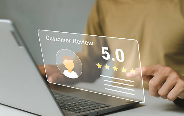 Businessman using laptop give rating to service experience on online application, 5-star satisfaction, satisfaction feedback review, good quality most.