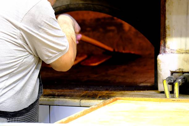 istock Konya meat pide, a Turkish culinary delight, is baked in a stone oven. 2227017439