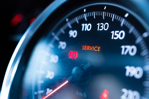 istock Car Dashboard Warning: Speedometer with Brake and Service Alerts 2227017476