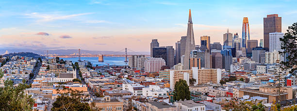 istock San Francisco skyline panorama at sunset with Bay Bridge and downtown skyline 2227017542