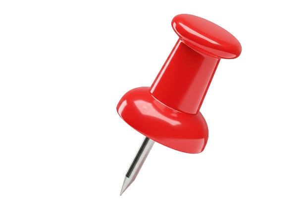 A red thumbtack pin isolated on a white background