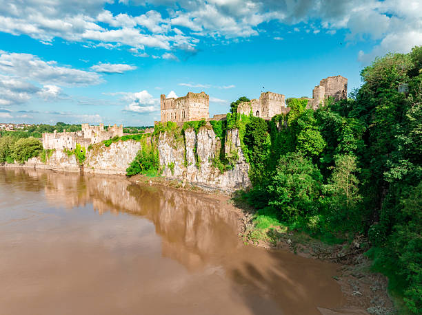Chepstow castle, located in chepstow, monmouthshire, wales, reflecting on the river wye