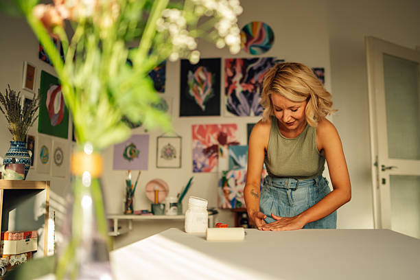 istock Female artist preparing canvas in her bright studio 2227019705