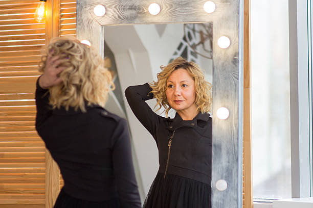 istock A Confident Woman Reflecting in the Mirror 2227020230