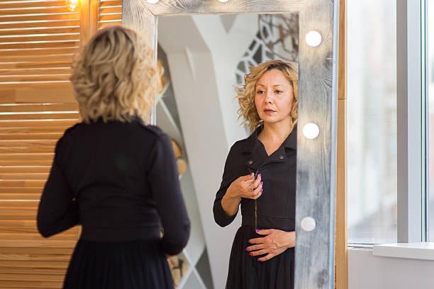 istock A Confident Woman Reflecting in the Mirror 2227021288