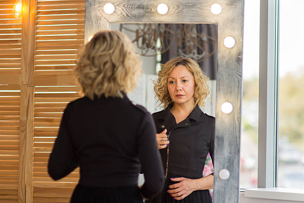 istock A Confident Woman Reflecting in the Mirror 2227021328