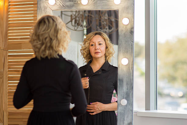 istock A Confident Woman Reflecting in the Mirror 2227021334