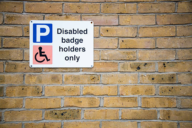 istock Disabled badge holders only parking sign 2227021757