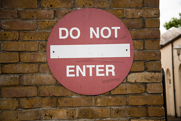 istock Red DO NOT ENTER sign mounted on a wallivate area. 2227021921