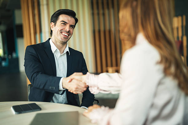 istock Successful business agreement sealed with a handshake in modern office 2227023271