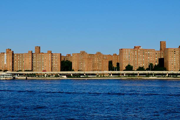 istock Public Housing Wall Along the East River (New York, New York, USA) 2227024875