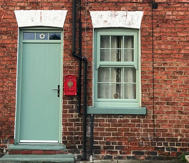 istock Jade Green painted front door and window 2227030693