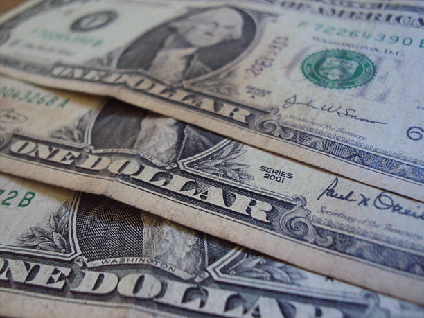 istock Close up of US one dollar bills 2227035277