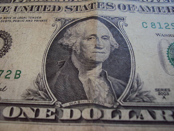 istock Close up of US one dollar bills 2227035322