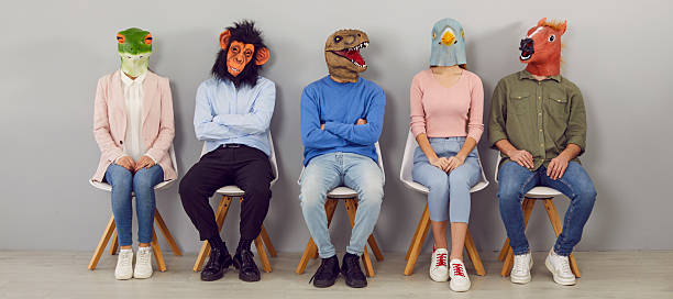 istock Diverse people in animal masks sit in line 2227036686