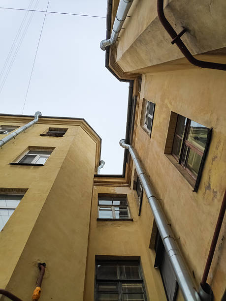 istock Building with a lot of windows and a tall tower 2227037548