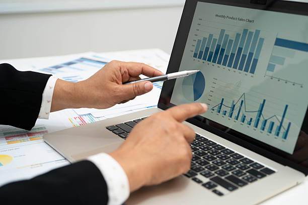 istock Asian business woman working with financial graph. 2227040926
