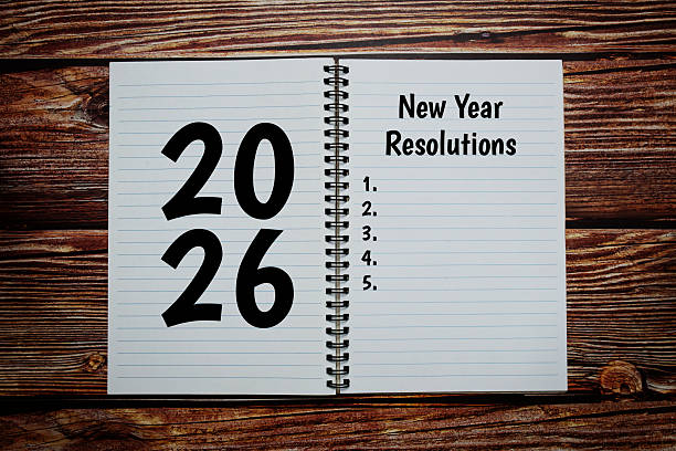 istock 2026 New Year Resolutions text message written on wooden background 2227040968