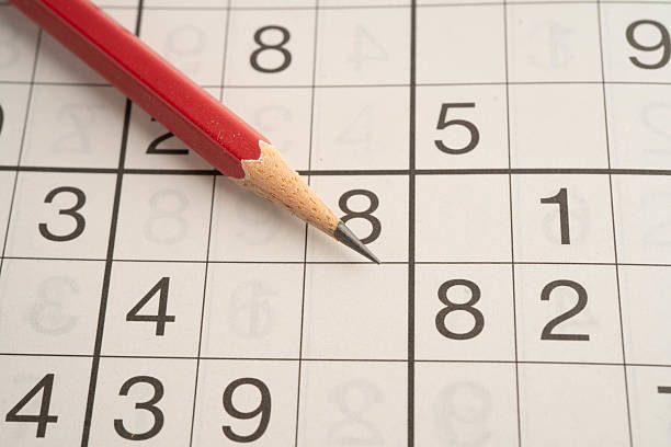 istock Sudoku puzzle, game to play for keep you brain younger for developing Alzheimer disease in senior patient. 2227041025