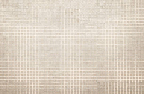 istock Cream light ceramic wall and floor tiles mosaic background in bathroom and kitchen. Design pattern geometric with grid wallpaper texture decoration pool. Simple seamless abstract surface clean. 2227042106