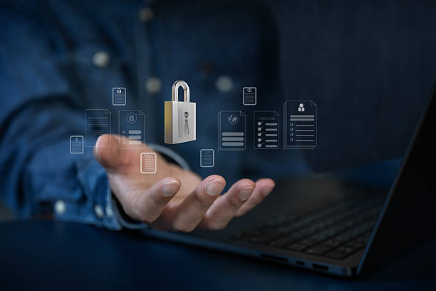 istock The business man work with laptop seek data folder are locking icon floating on screen 2227044302