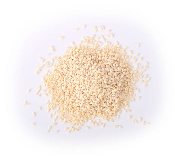 istock White sesame seeds isolated on white background. top view 2227047782