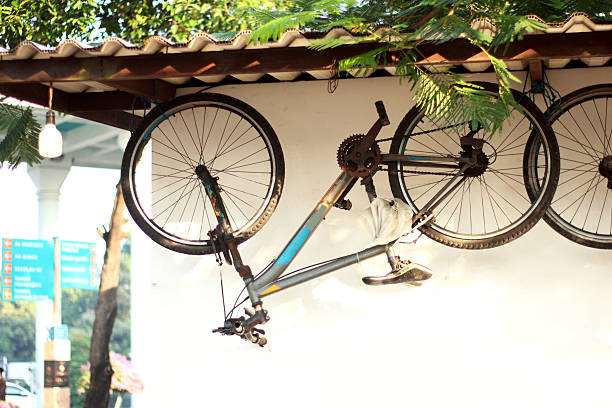 Bicycles are stored by hanging them on the ceiling.