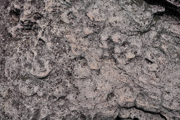istock Natural stone terrain with wavy Cross-Bedding texture and black stains spot 2227050784