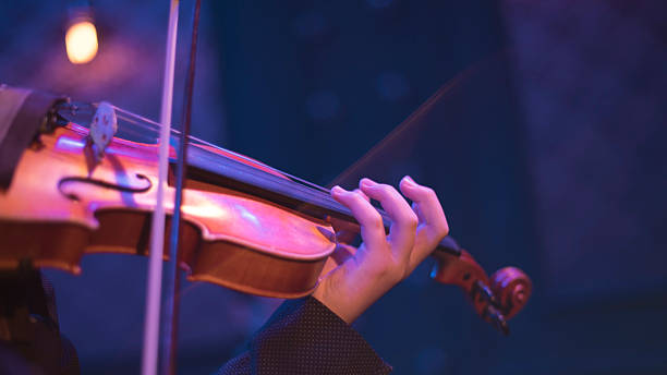 istock violin at a concert 2227052511