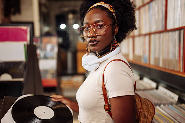 istock Woman at Vinyl Store 2227056158