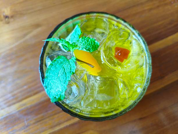 istock Refreshing Cocktail with Mint and Fruit Garnish 2227070424