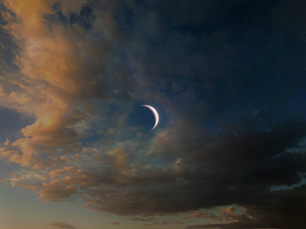istock New moon in the evening sky. Astronomical landscape. 2227071359
