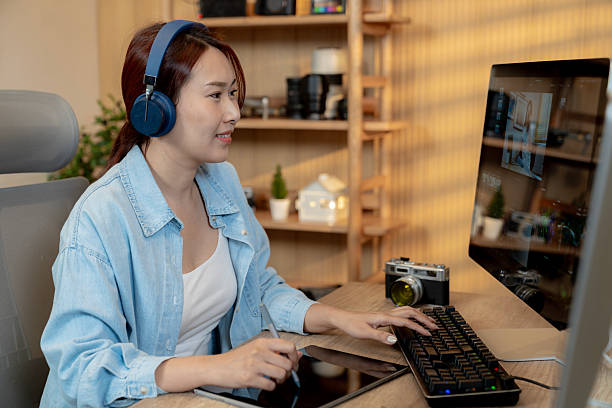 istock Freelance Video Editor Working Happily from Home 2227072593