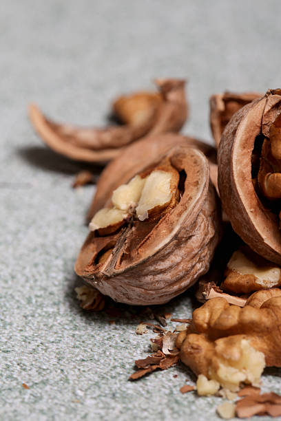 istock Close up of cracked walnuts 2227073323