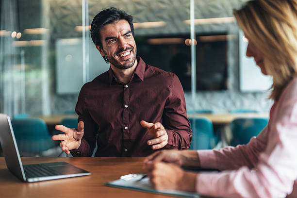 istock Professional business discussion and presentation in modern office environment 2227074849
