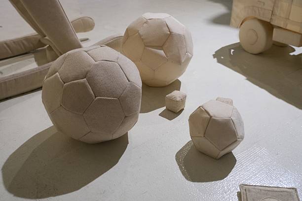 Soft fabric geometric balls and shapes on floor
