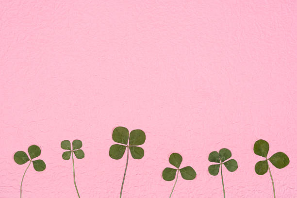 Background material with a four-leaf clover motif