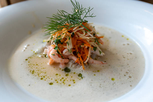 creamy lofoten fish soup fiskesuppe taken in a restauran in lofoten, norway.