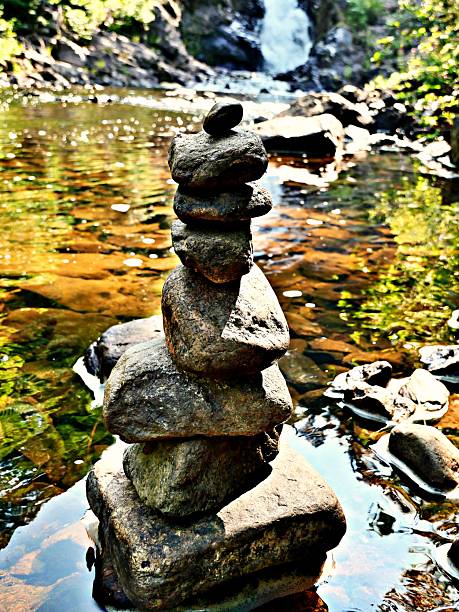 A view of a inuksuk in the river stream