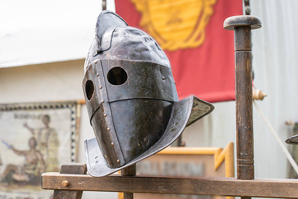 istock Ancient Roman gladiator helmet in a military camp 2227089833