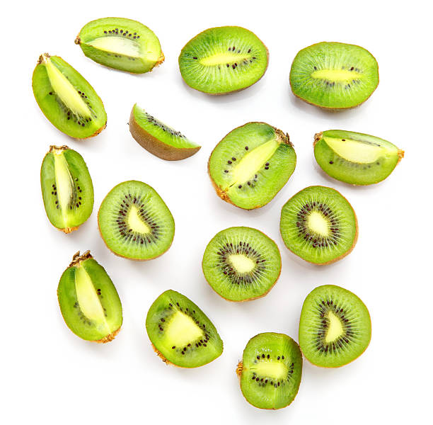 istock Halves and kiwi fruit slices on a white background. 2227111899