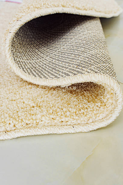 istock close-up. beige Interior pile carpet made of polypropylene. 2227112614