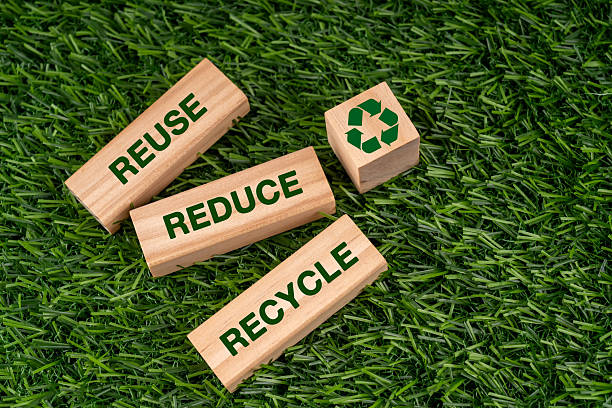 istock Reuse reduce recycle text and symbol on wood block 2227114336