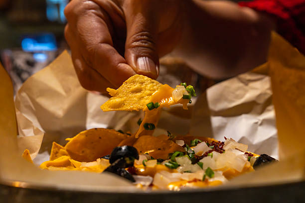 istock cheese nachos on the table 2227116136